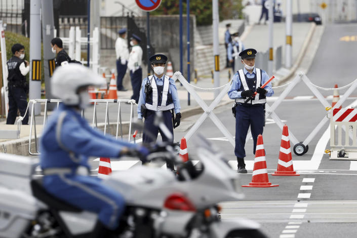 Police officers stand guard near the main venue for the Group of Seven nations' meetings in Hiroshima, western Japan Thursday, May 18, 2023. Leaders of seven of the world’s most powerful democracies will gather this weekend for the G-7 summit in Hiroshima, the location of the world's first atomic attack at the end of World War II. (Yosuke Mizuno/Kyodo News via AP)