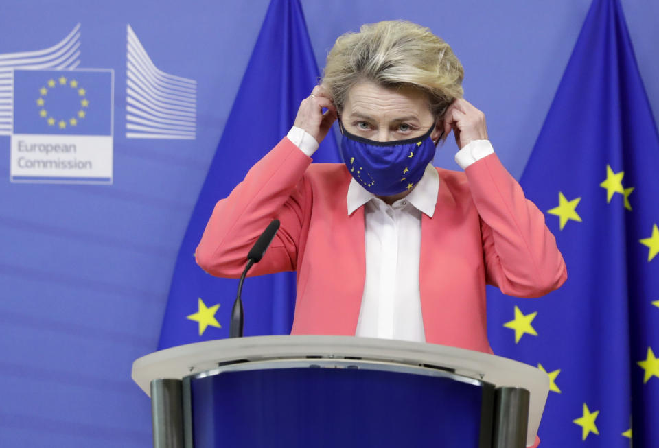 European Commission President Ursula von der Leyen arrives to deliver a statement at the EU headquarters in Brussels, Sunday, Dec. 13, 2020. Britain and the European Union say talks will continue on a free trade agreement — a deal that if sealed would avert New Year's chaos for cross-border traders and bring a measure of certainty for businesses after years of Brexit turmoil. (Olivier Hoslet/Pool Photo via AP)