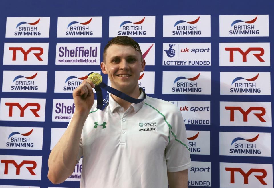 Ross Murdoch with his gold medal