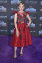 <p>The ‘American Housewife’ star wears a red, floral midi dress. <em>[Photo: Getty]</em> </p>