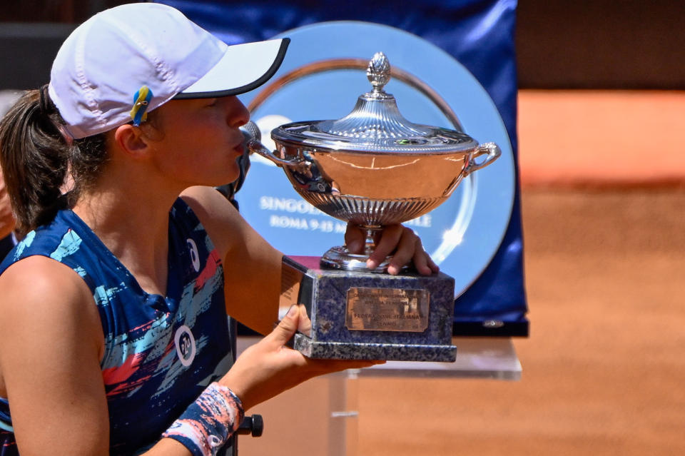 WTA World No.1 Iga Swiatek (pictured) with the trophy after winning the WTA Master 1000 Internazionali BNL D'Italia.