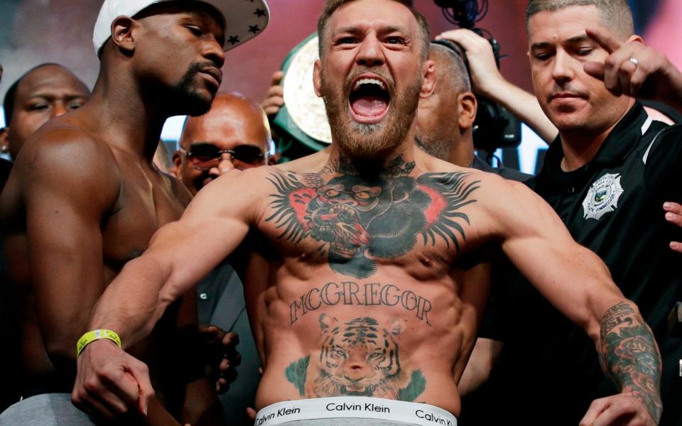 Earlier today McGregor was stripped of his UFC lightweight title - AP