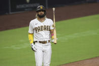 San Diego Padres' Fernando Tatis Jr. flips his bat after striking out against Los Angeles Dodgers starting pitcher Clayton Kershaw in the third inning of a baseball game Monday, Sept. 14, 2020, in San Diego. (AP Photo/Derrick Tuskan)