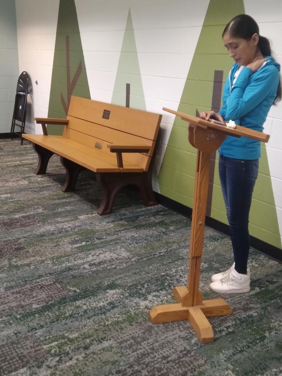 Monnie Smith, a member of Christopher Pratt's family, speaks during an event on Friday, Oct. 20, 2023, at Heartwood Elementary in Mason. Christopher died in the care of his aunt, Jessica Bice, at the age of 6 on on Aug. 17, 2018. A commemorative bench will be installed on the playground honoring him.