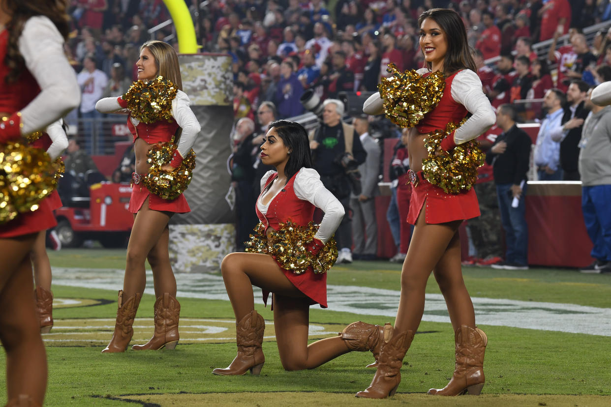 A 49ers cheerleader remained on the team after kneeling during the national anthem and took a knee again during “Monday Night Football.” (Getty)