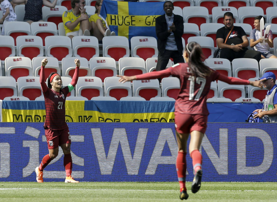 Thailand's Kanjana Sung-Ngoen, left, celebrates after scoring her side's first goal during the Women's World Cup Group F soccer match between Sweden and Thailand at the Stade de Nice in Nice, France, Sunday, June 16, 2019. (AP Photo/Claude Paris)