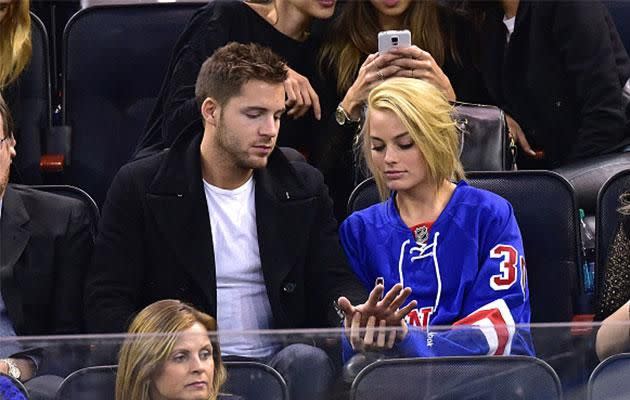 Was Robbie giving us a hint back in February when the love birds attended an ice hockey game? Photo: Getty Images