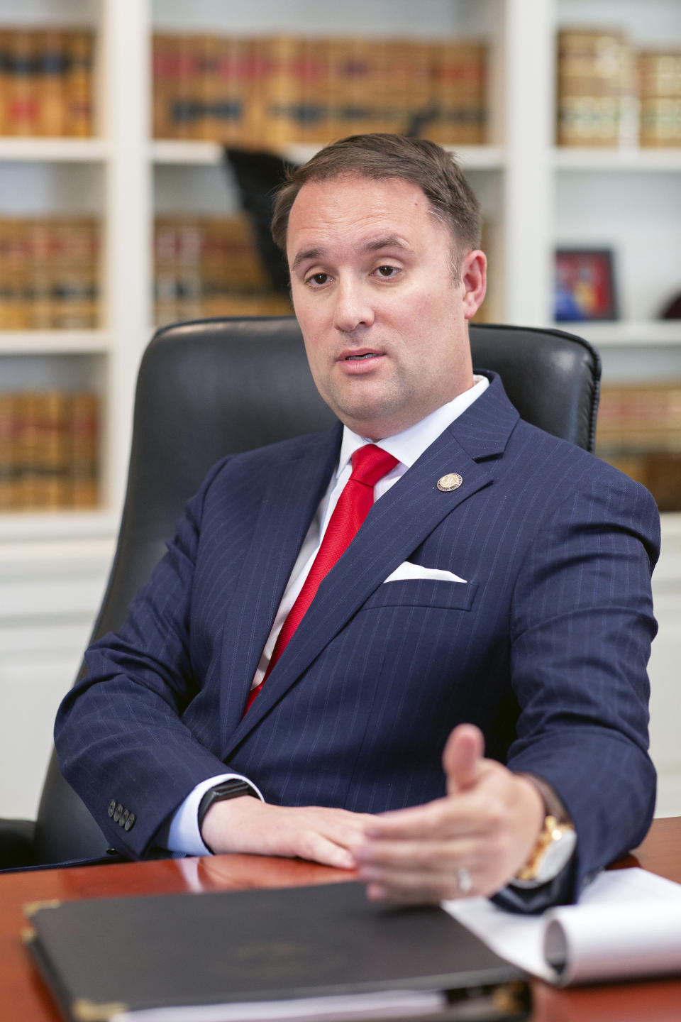 Virginia Attorney General Jason Miyares speaks during an interview at the Office of the Attorney General in Richmond, Va., Tuesday, May 9, 2023. Miyares has defended his decision not to join most of his Republican counterparts around the country in supporting a lawsuit challenging the safety and approval of the abortion medication mifepristone. (AP Photo/Ryan M. Kelly)