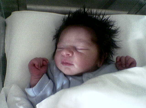 newborn baby with hair