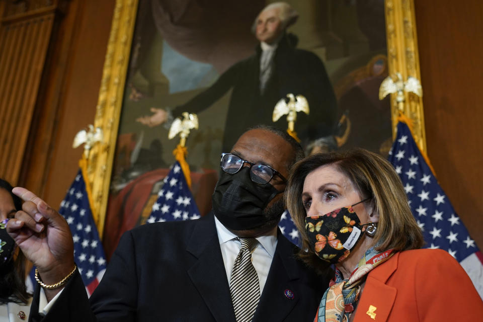 House Speaker Nancy Pelosi of Calif., talks with Rep. Troy Carter, D-La., following a ceremonial swearing-in on Capitol Hill in Washington, Tuesday, May 11, 2021. (AP Photo/Susan Walsh)