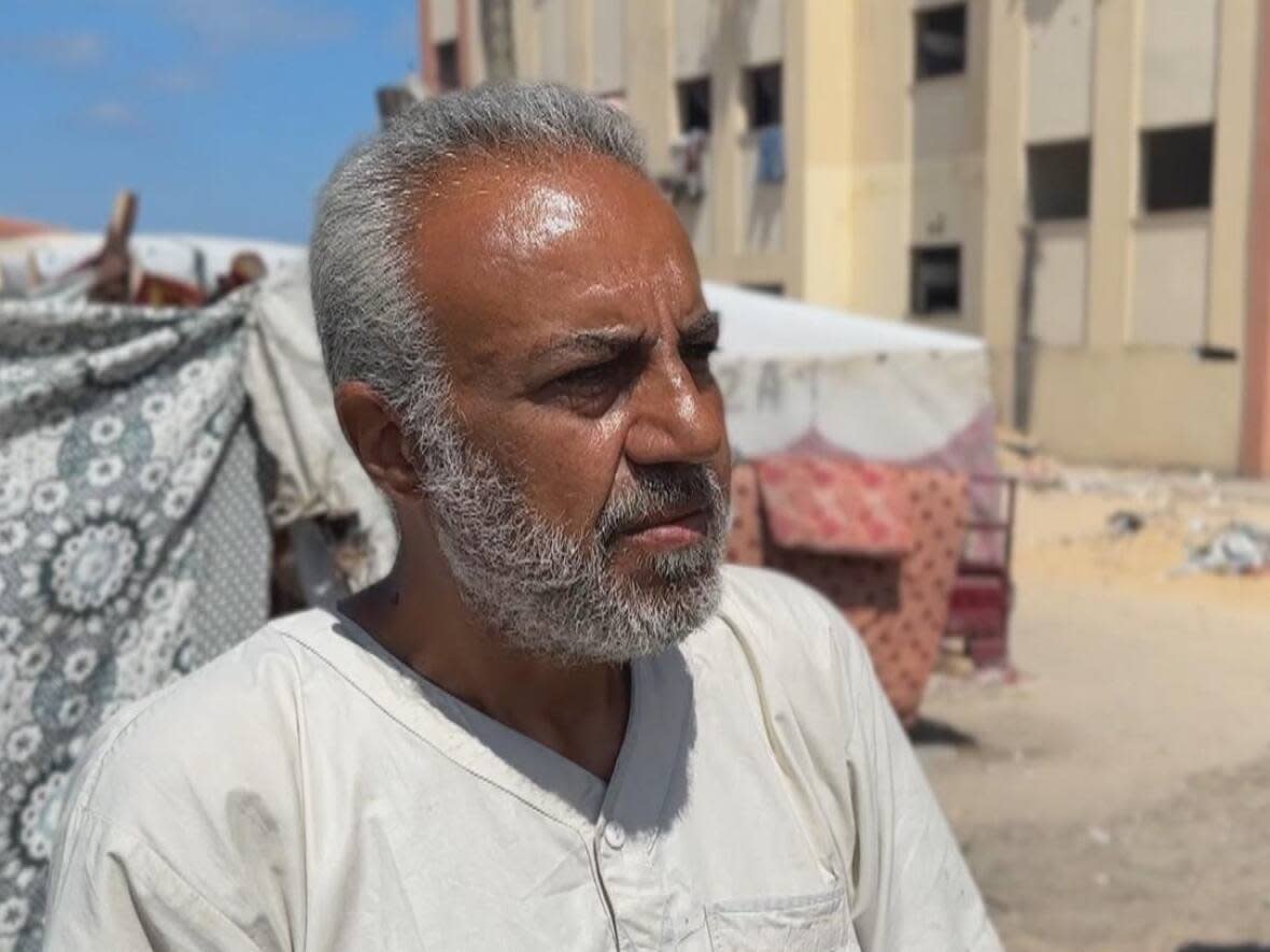 Ahmed Abu Watfa, 52, speaks on the 76th anniversary of Nakba, or 