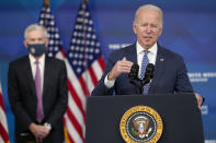 President Joe Biden, right, speaks as he announces that he is nominating Jerome Powell, left, for a second four-year term as Federal Reserve chair, during an event in the South Court Auditorium on the White House complex in Washington, Monday, Nov. 22, 2021. Biden also nominated Lael Brainard as vice chair, the No. 2 slot at the Federal Reserve. (AP Photo/Susan Walsh)