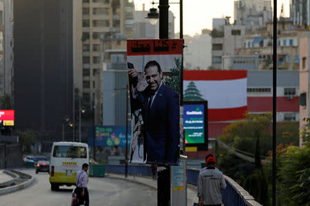 A poster depicting Saad al-Hariri is seen in Beirut, Lebanon November 17, 2017. REUTERS/Jamal Saidi