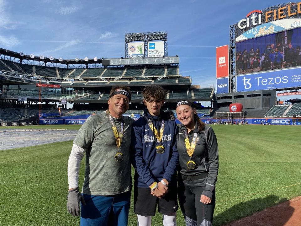 From left: Gary, Nico and Darcy Ottomanelli after competing in the Citi Field Spartan Stadion 5K race in Queens, N.Y. on Nov. 20, 2021.