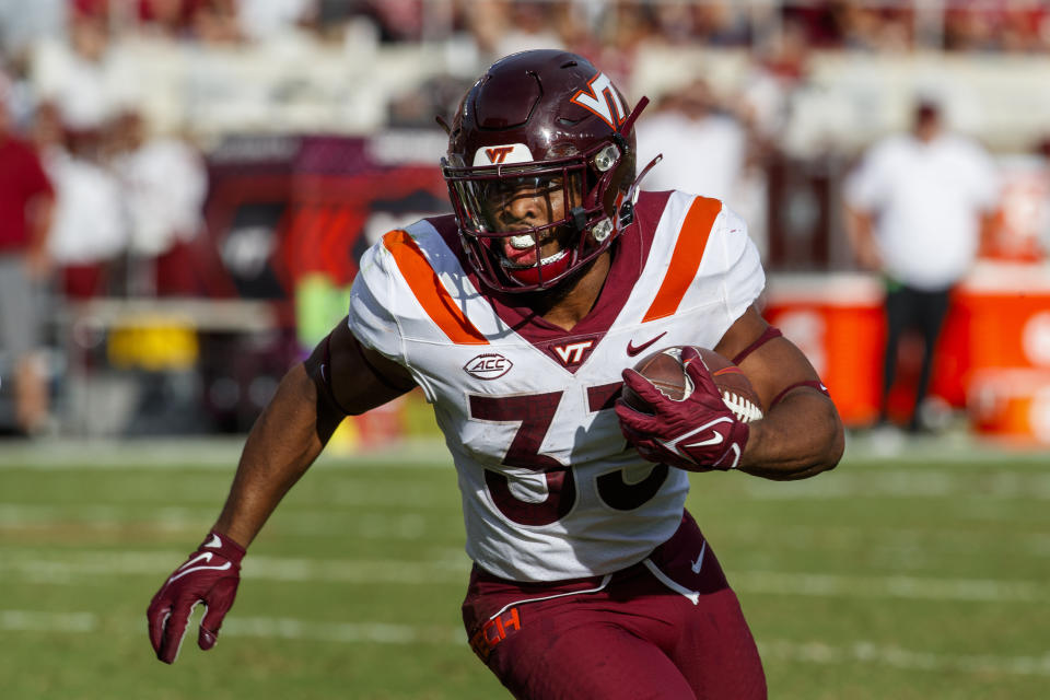 Virginia Tech running back Bhayshul Tuten (33) heads to the end zone for Virginia Tech's first touchdown during the first half of an NCAA college football game against Florida State, Saturday, Oct. 7, 2023, in Tallahassee, Fla. (AP Photo/Colin Hackley)