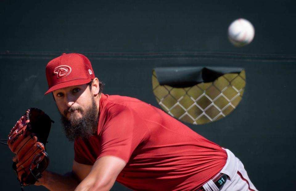 Diamondbacks pitcher Caleb Smith throws during practice, March 11, 2022, at Salt River Fields at Talking Stick, 7555 N. Pima Road, Scottsdale, Arizona.