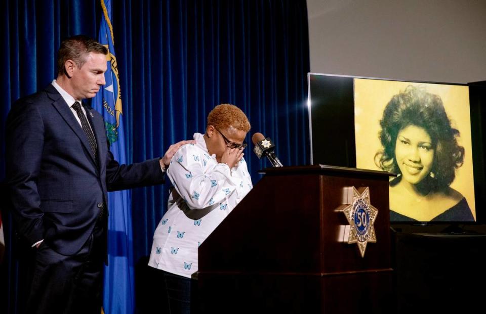 Teresa Board, sister of victim Pearl Wilson Ingram, is comforted by Metropolitan Police Department Lt. Jason Johansson as she talks about her sister’s murder at a press conference about the cold case that is now closed after police connected DNA evidence to the killer at Metro Headquarters in Las Vegas, Monday, Feb. 6, 2023. (Rachel Aston/Las Vegas Review-Journal via AP)