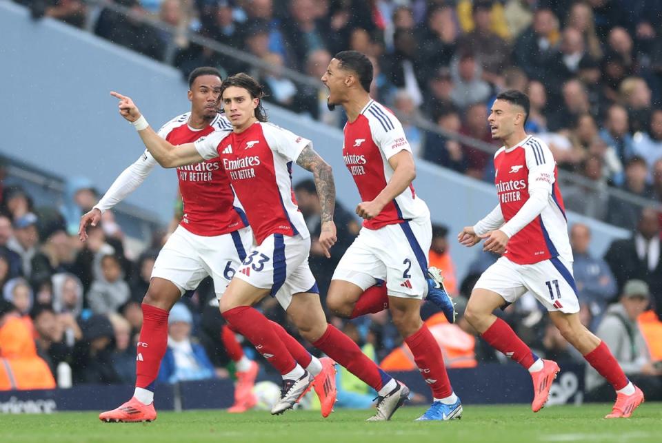 Riccardo Calafiori celebrates after scoring Arsenal’s equaliser (Getty Images)