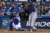 Atlanta Braves' Adam Duvall celebrates his solo home run in the second inning against the Los Angeles Dodgers in Game 4 of baseball's National League Championship Series Wednesday, Oct. 20, 2021, in Los Angeles. (AP Photo/Marcio Jose Sanchez)