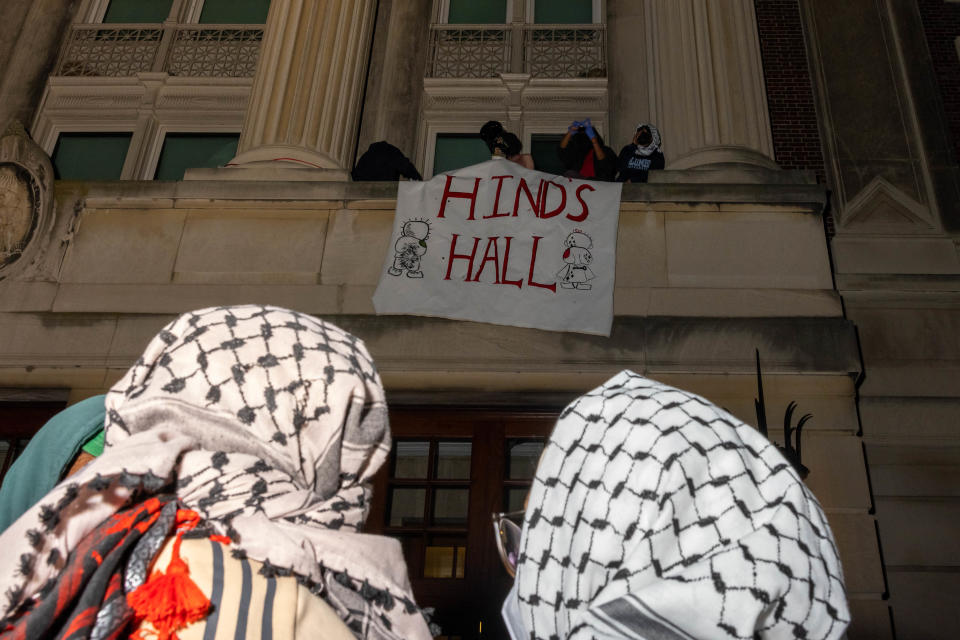 Pro-Palestinian demonstrators watch as protesters take over Hamilton Hall on Columbia's campus on Tuesday, April 30, 2024 in New York City. / Credit: Alex Kent / Getty Images