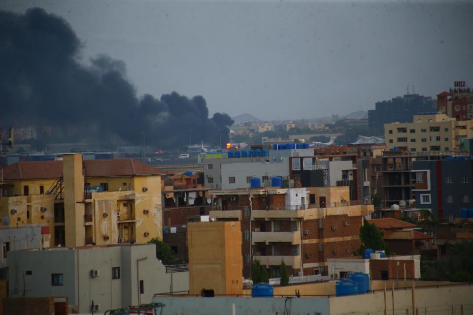 Smoke rises as clashes continue in the Sudanese capital on April 17, 2023.