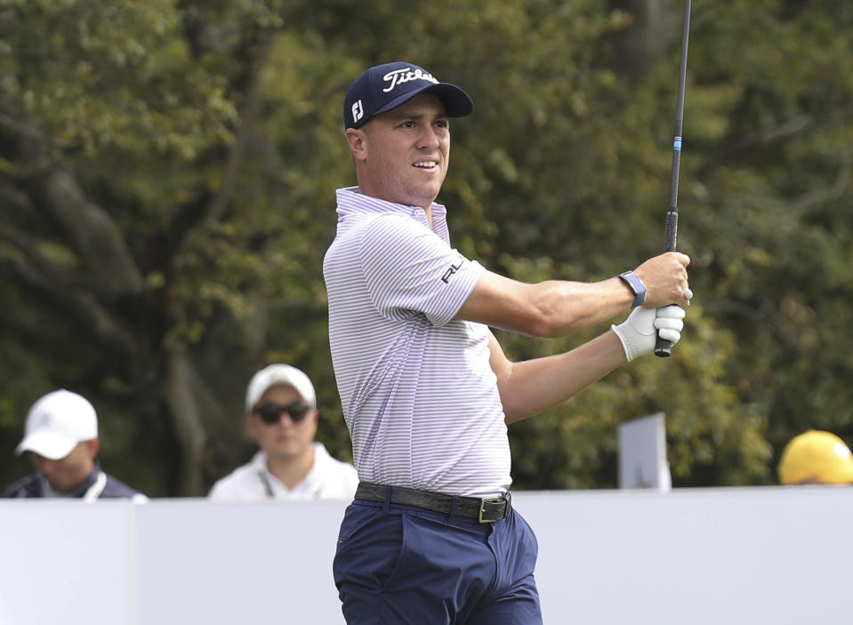 Justin Thomas of the United States watches his shot on the 6th hole during the first round of the CJ Cup PGA golf tournament at Nine Bridges on Jeju Island, South Korea, Thursday, Oct. 17, 2019.(Park Ji-ho/Yonhap via AP)