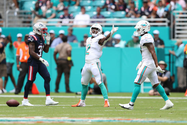 MIAMI GARDENS, FLORIDA - SEPTEMBER 11: Chase Edmonds #2 of the Miami Dolphins celebrates after a first down reception during the second quarter of the game against the New England Patriots at Hard Rock Stadium on September 11, 2022 in Miami Gardens, Florida. (Photo by Megan Briggs/Getty Images)