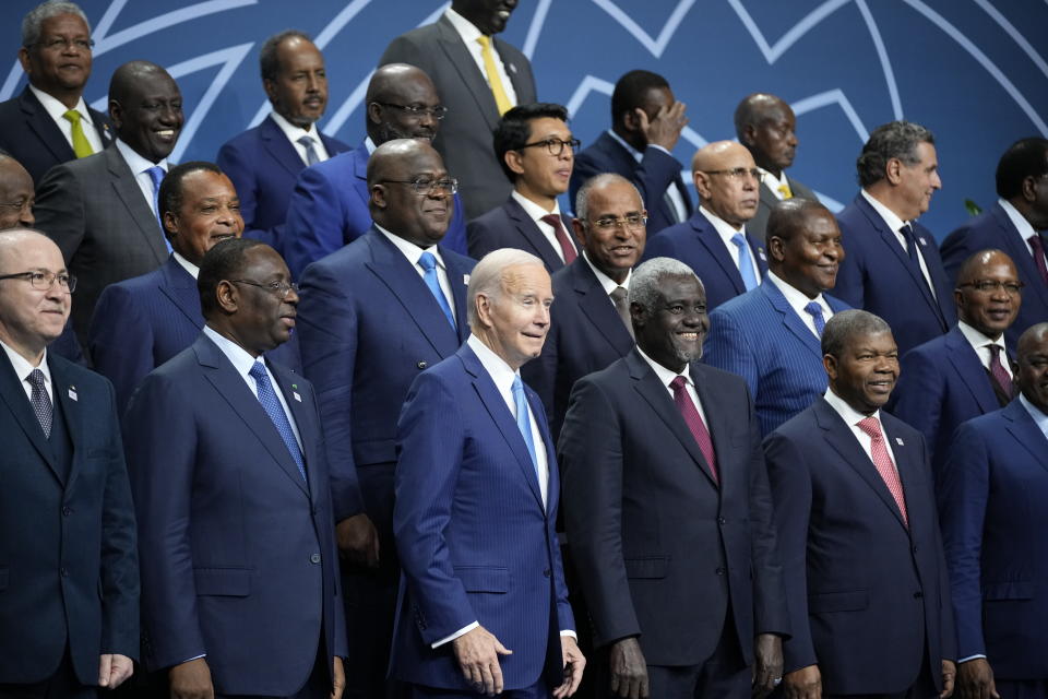 President Joe Biden and other leaders pose for a family photo during the U.S.-Africa Leaders Summit at the Walter E. Washington Convention Center in Washington, Thursday, Dec. 15, 2022. (AP Photo/Andrew Harnik)