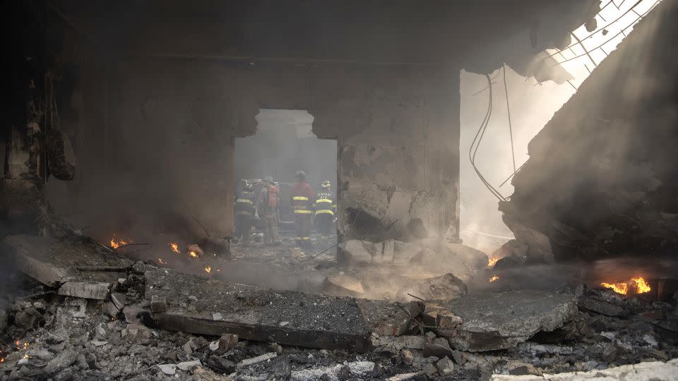 Fires burn after the blast on August 14. - Jolivel Brito/AP