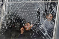 <p>A shopkeeper looks on behind broken glass of his shop, near the site of a car bomb attack in Kabul, Afghanistan, Jan. 27, 2018. (Photo: Omar Sobhani/Reuters) </p>