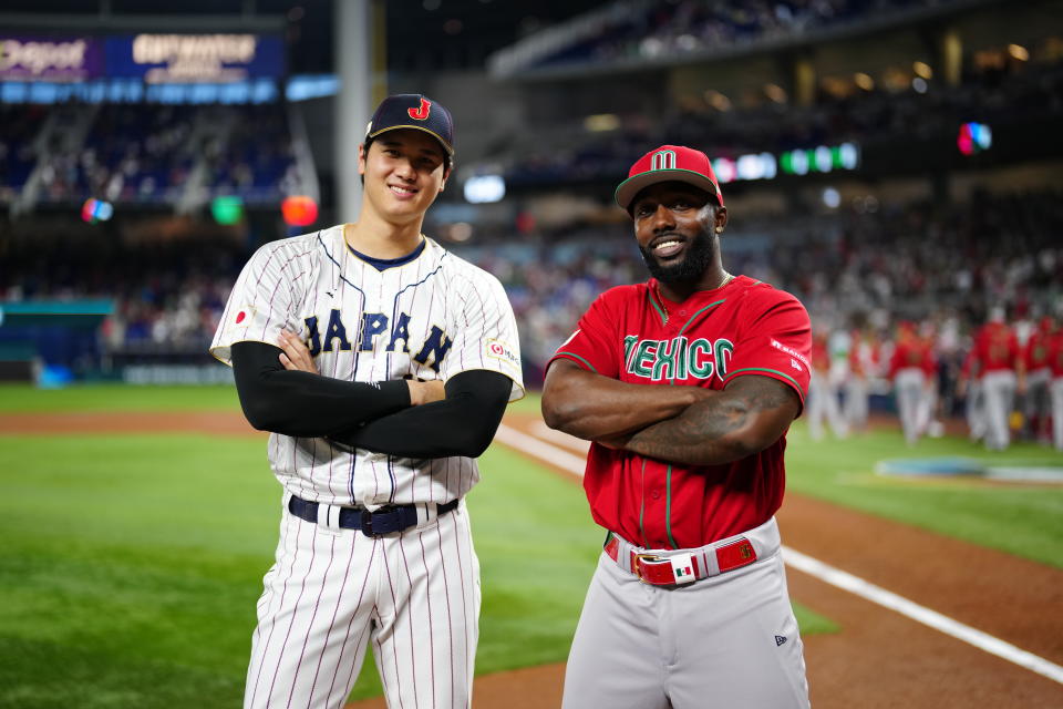 Randy Arozarena (R), pictured with Shohei Ohtani of Team Japan at a World Baseball Classic semifinals, solidified his star power with his arms-crossed celebration. (Photo by Daniel Shirey/WBCI/MLB Photos via Getty Images)