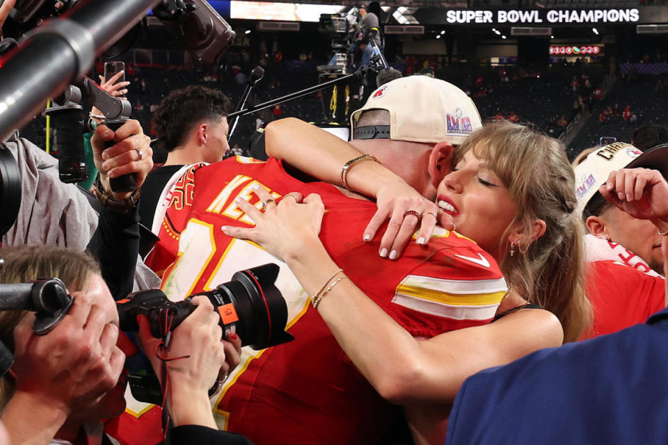 Travis Kelce #87 of the Kansas City Chiefs hugs Taylor Swift after defeating the San Francisco 49ers 25-22 during Super Bowl LVIII at Allegiant Stadium on February 11, 2024 in Las Vegas, Nevada.  / Credit: Jamie Squire/Getty Images