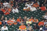 Empty seats are seen at Minute Maid Park during the eighth inning of Game 2 of the baseball World Series against the Washington Nationals Wednesday, Oct. 23, 2019, in Houston. The Nationals were leading the game 11-2. (AP Photo/David J. Phillip)