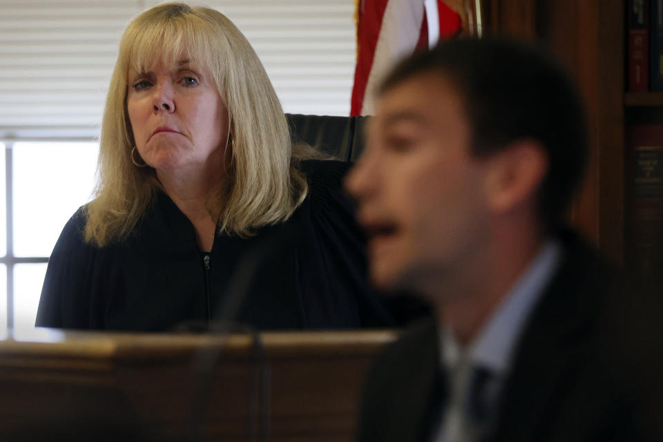 Judge Beverly Cannone listens as Timothy Nuttall, from the Canton Fire Department, testifies during Karen Read's murder trial, Tuesday, April 30, 2024, in Dedham, Mass. Read, 44, of Mansfield, faces several charges including second degree murder in the death of her Boston Police officer boyfriend John O’Keefe, 46, in 2022. (Nancy Lane/The Boston Herald via AP, Pool)
