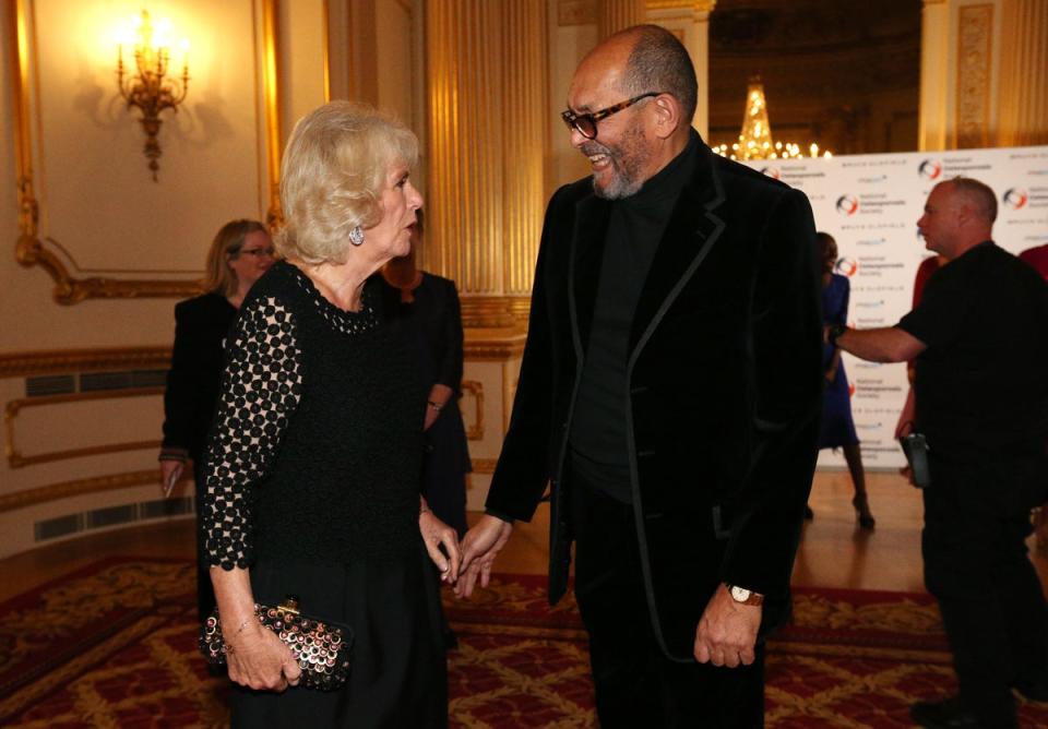 Bruce Oldfield is greeted by Camilla, Duchess of Cornwall during  the Bruce Oldfield Fashion Show at Lancaster House in support of the National Osteoporosis Society on November 15, 2017 (Getty Images)