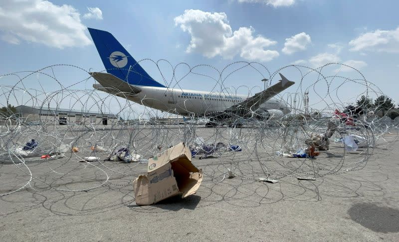 FILE PHOTO: A commercial airplane is seen at the Hamid Karzai International Airport a day after U.S troops withdrawal in Kabul