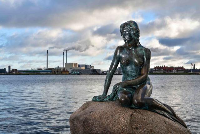 Denmark: Copenhagen. Emblem of the city, the little mermaid is a bronze statue perched on a rock in Churchill Park. It is a representation of the character from Hans Christian Andersen&#39;s eponymous tale. (Photo by: Soudan/Alpaca/Andia/Universal Images Group via Getty Images)