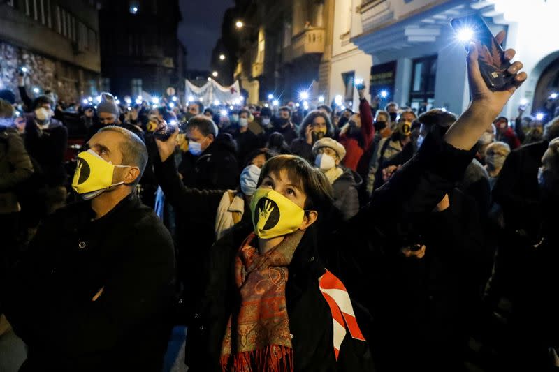 Supporters gather in front of the University of Theatre and Film Arts, in Budapest