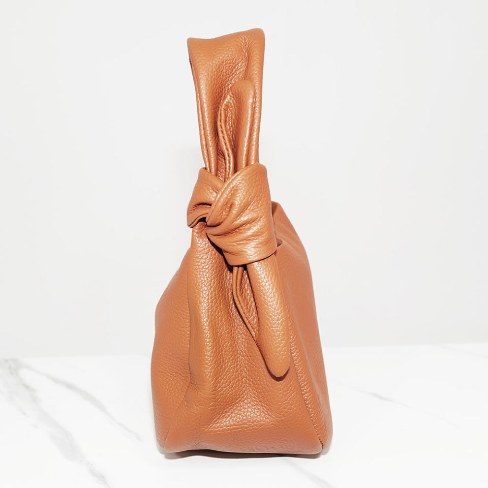 WWD Shop editors test Quince's Italian Leather Mini Bow Bag