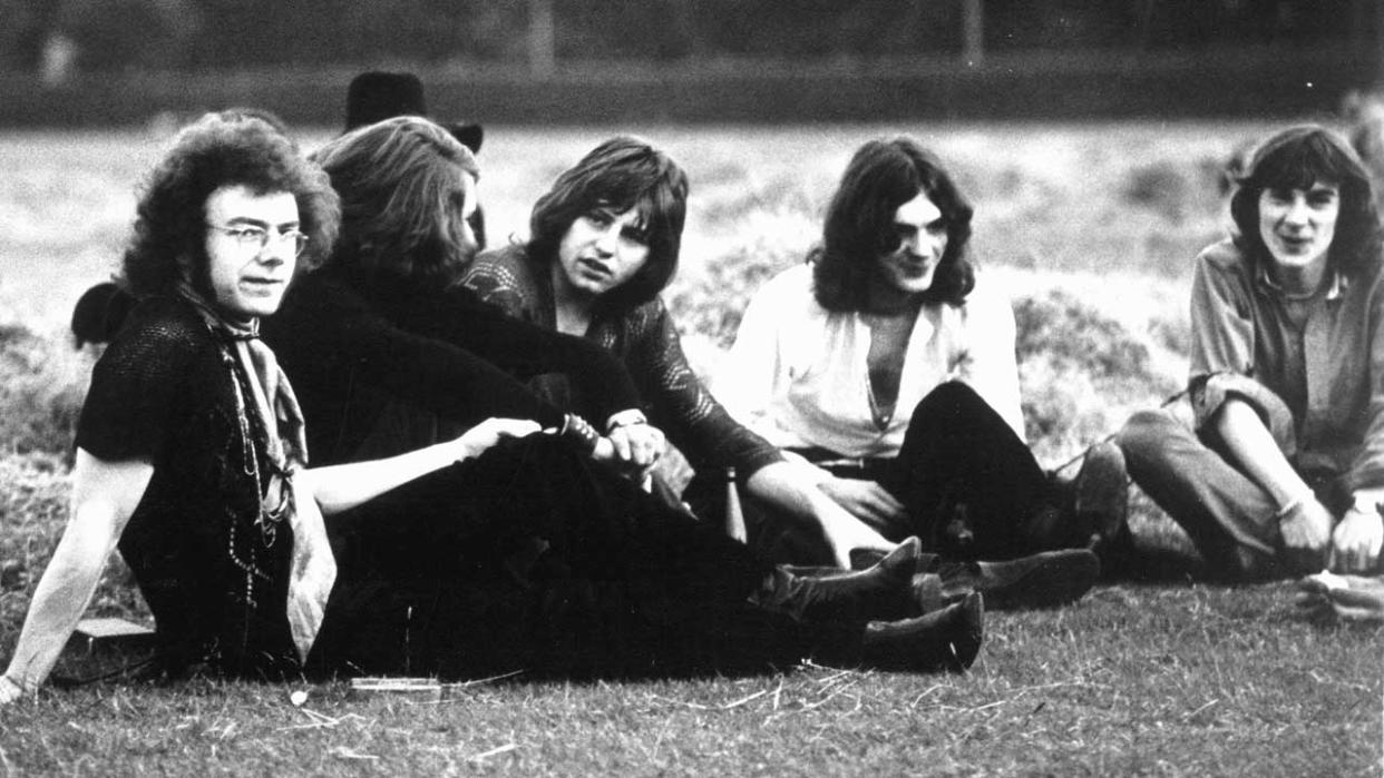  King Crimson sitting on an area of grass, 1969  . 