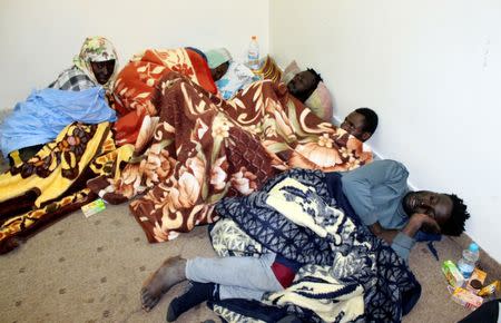 Survivor migrants who were in a boat spending 12 days at sea without food or water are seen in Misrata, Libya December 4, 2018. REUTERS/Ayman al-Sahili