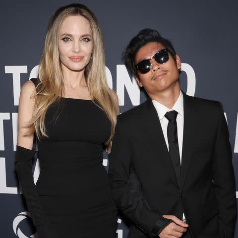 <p>Monica Schipper/EveryStory2024/Getty</p> Angelina Jolie (left) and son Pax at the Toronto Film Festival