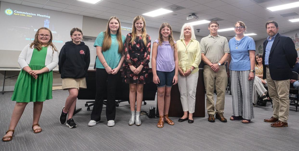 Maury County students and adults win an art contest, featuring the 120th anniversary of the Maury County Courthouse.