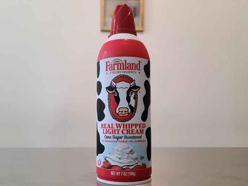 can of farmland whipped cream on a table