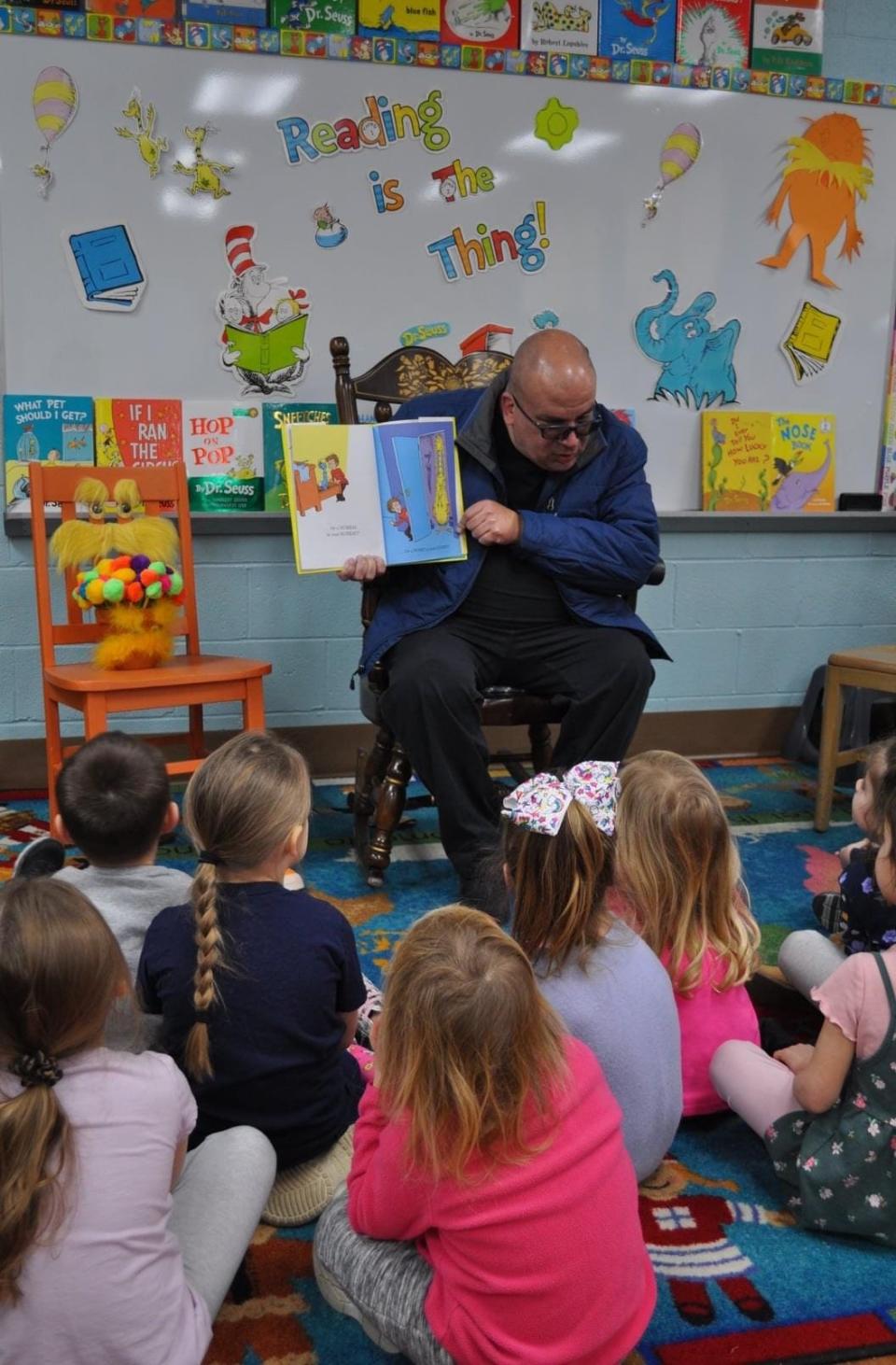 Fr. Jeff Coning read Dr. Seuss’s "There’s a Wocket in my Pocket."