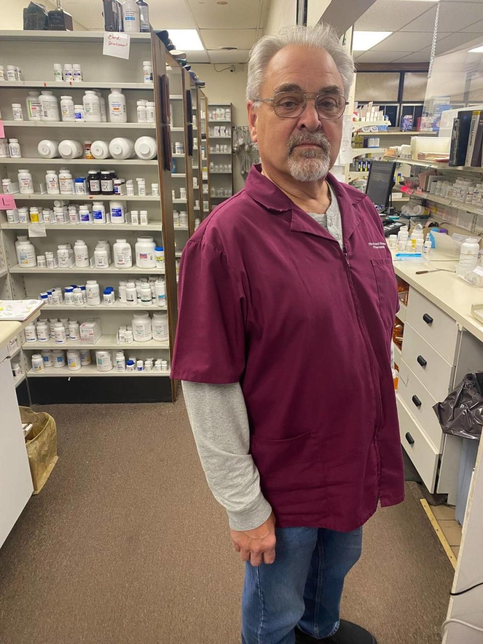 Richard Slone stands behind the counter at one of three independent pharmacies he owns and operates in Eastern Kentucky: RX Discount Pharmacy in Hazard. Crippling fees have led Slone to pull from his personal retirement and savings to keep his stores afloat.