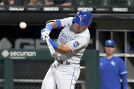 Kansas City Royals' Nicky Lopez doubles off Chicago White Sox relief pitcher Reynaldo Lopez during the seventh inning of a baseball game Thursday, Aug. 5, 2021, in Chicago. (AP Photo/Charles Rex Arbogast)