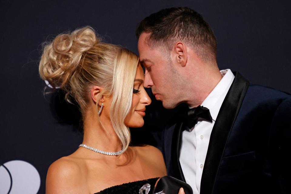 Paris Hilton and husband Carter Reum arrive for the Recording Academy and Clive Davis pre-Grammy gala at the Beverly Hilton hotel in Beverly Hills, California on February 4, 2023.