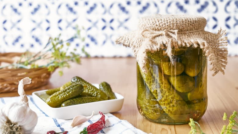 dill pickles in glass jar