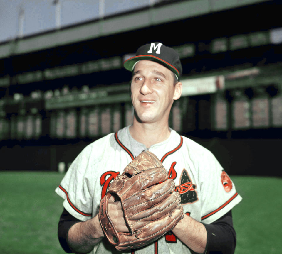 Warren Spahn, with glove in hand, pitcher for the Milwaukee Braves baseball team in March 1958. Location unknown. (AP Photo)